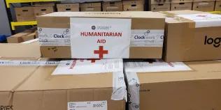 IT donation to KNU showing many boxes