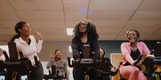 Students enjoying the Afrospin session on spin bikes