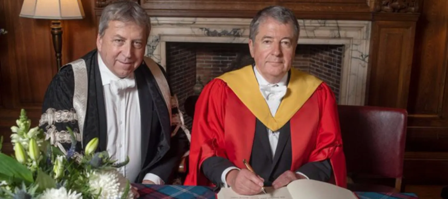 Prof Sir Peter Mathieson and Stephen Wordsworth receiving his Honorary Degree