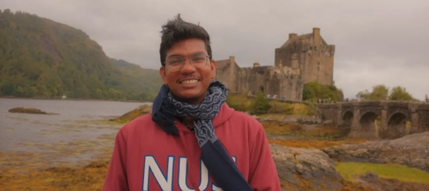 Photo of Muthukrishnan infront of Eliean Donan Castle