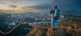 Student stands atop Arthur's seat