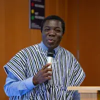 Man speaking into microphone