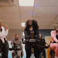 Students enjoying the Afrospin session on spin bikes