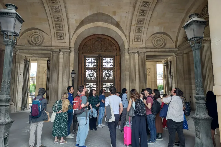 Students visiting the Cour Carée of the Louvre