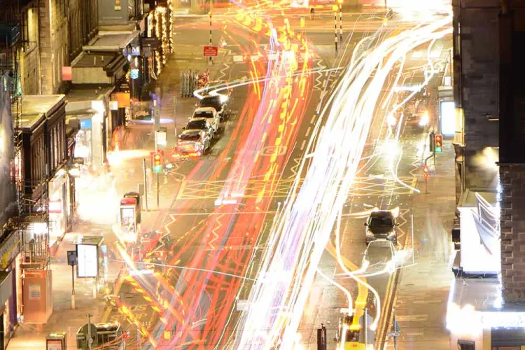 A long-exposed image showing where cars drive through Edinburgh.