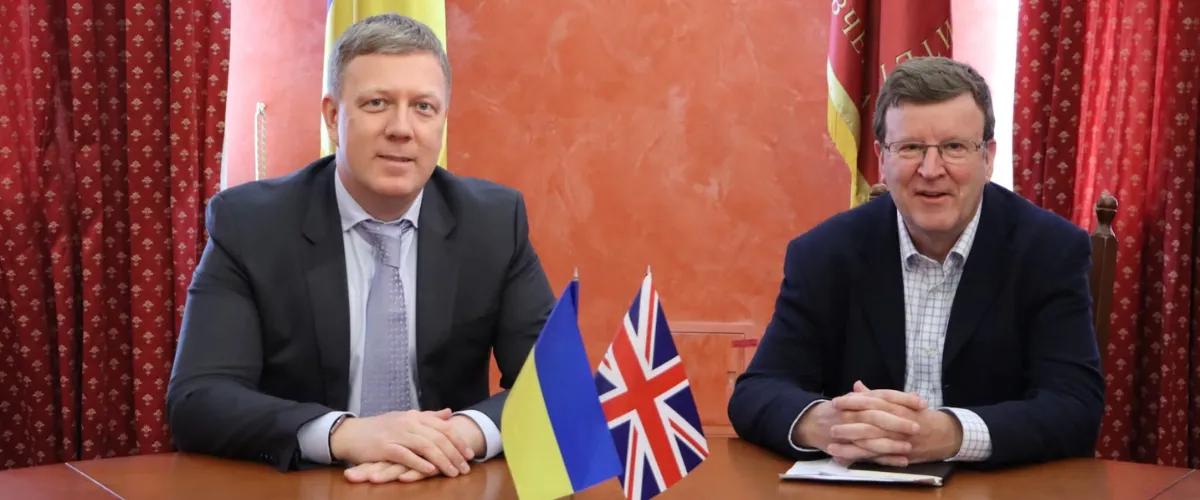 Professor Charles Cockell sitting to the right of Vice-rector of KNU Vadym Popko