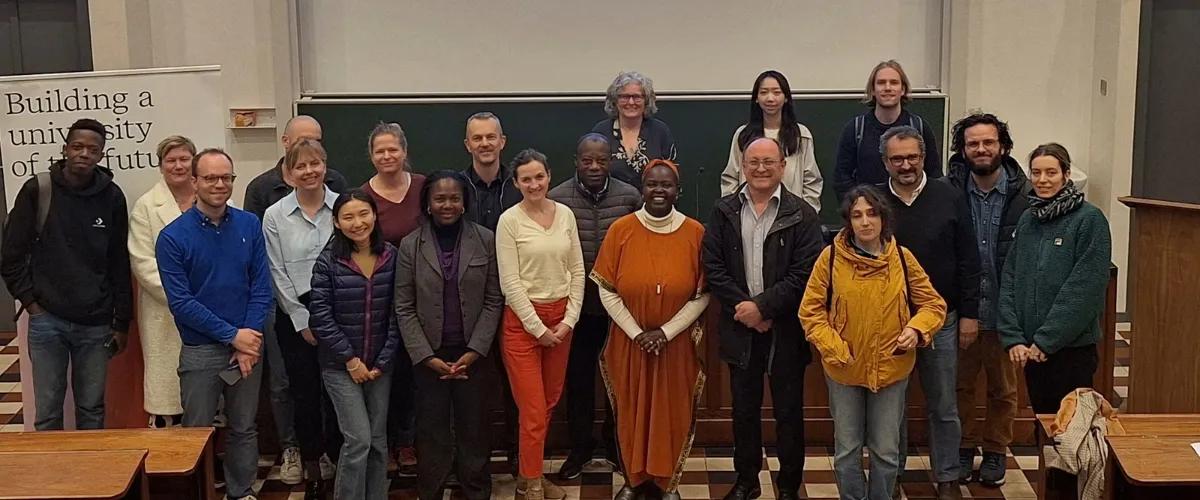 Margaret delivering a lecture to colleagues at KU Leuven