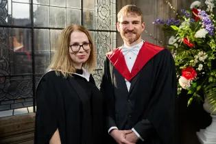 Ian MacDougall and Michelle Beagan collect the Principals Medal for organising donations of laptops to Ukraine