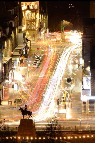A long-exposed image showing where cars drive through Edinburgh.