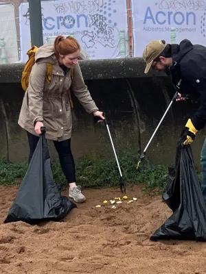 Two members of the Study and Work Away team litter picking